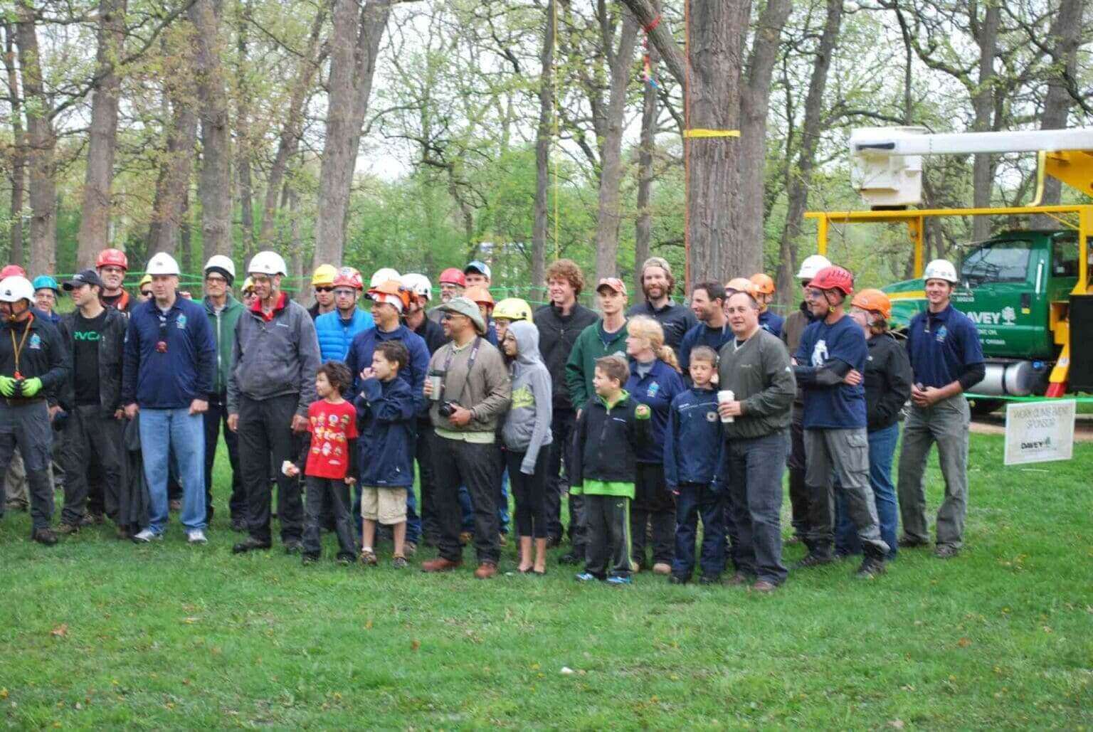 Group of people standing in a park.