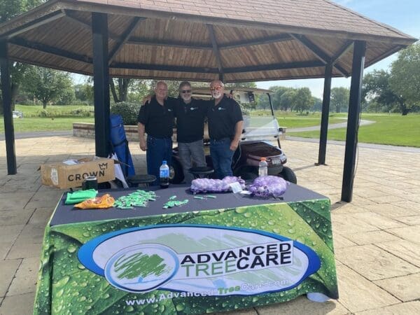 Advanced Tree Care booth at a golf course.