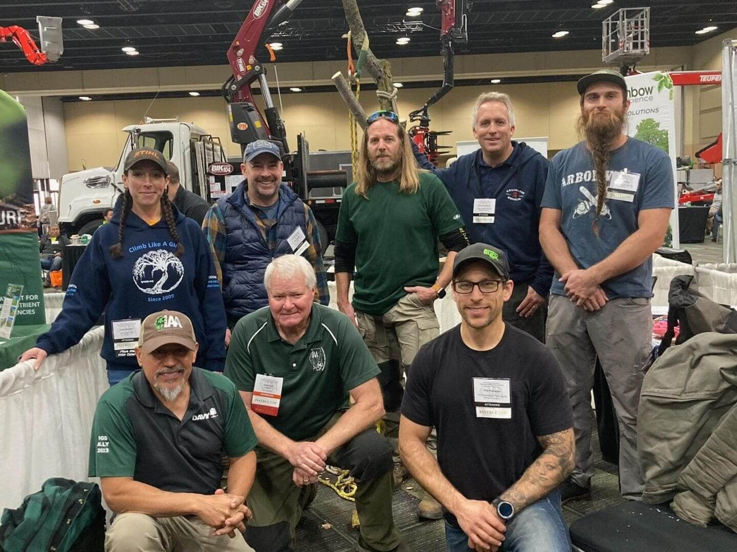 Tree care professionals at a trade show.