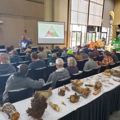 Classroom presentation with natural specimens display.